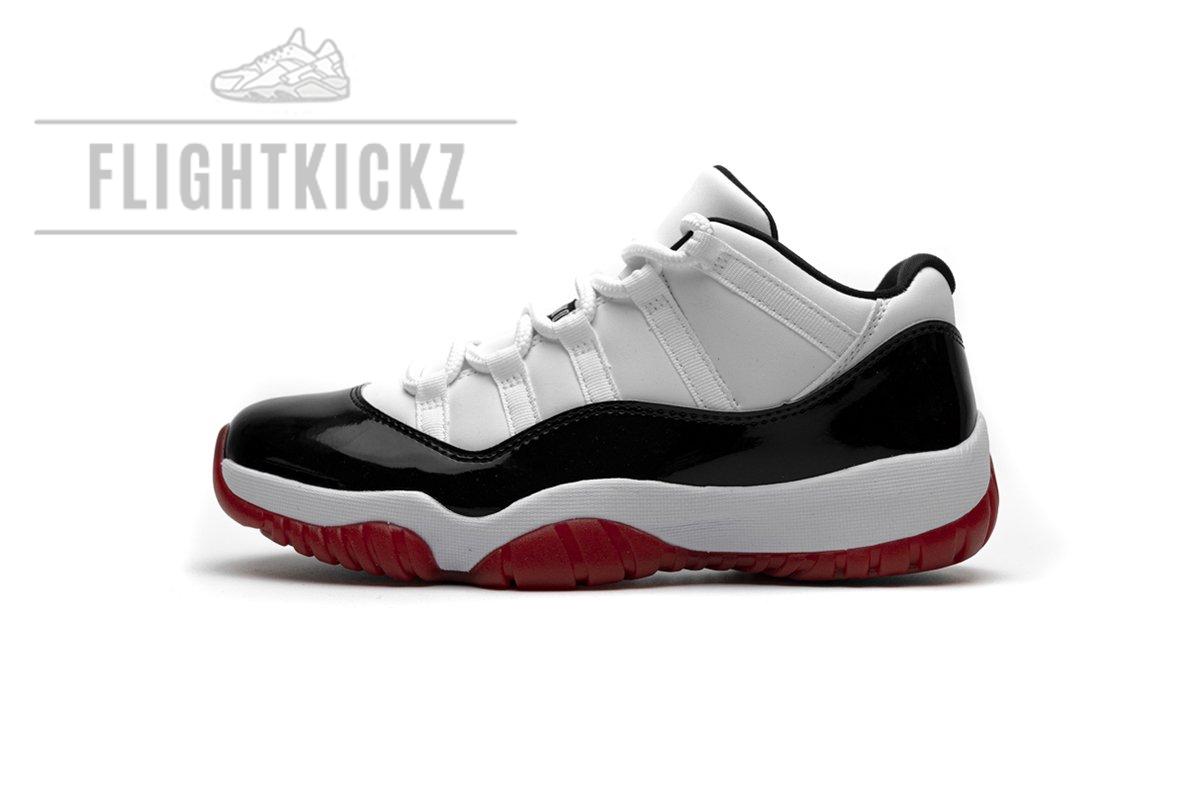AV2187-160 Air Jordan 11 Low “White Bred”